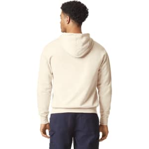 A lightweight hooded sweatshirt in a soft beige colour, featuring a hood and a simple, clean design.