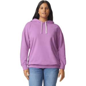 A lightweight hooded sweatshirt in lavender, featuring a relaxed fit and a drawstring hood. Includes a logo.