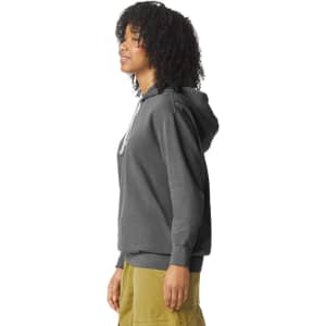 A lightweight hooded sweatshirt in grey, featuring a front pocket and a logo on the chest.