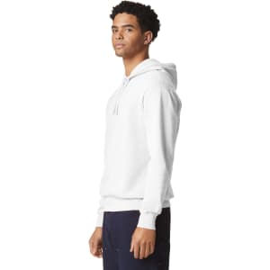 A lightweight hooded sweatshirt in white, featuring a front kangaroo pocket and a logo on the front.