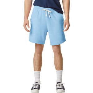 Light blue lightweight sweatshorts with a drawstring waistband, featured on a model standing.