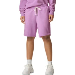 Lightweight sweatshorts in a vibrant lilac colour, featuring an elastic waistband and drawstring.