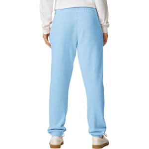 Light blue lightweight sweatpants with elastic waistband and tapered legs, featuring a small logo on the back.
