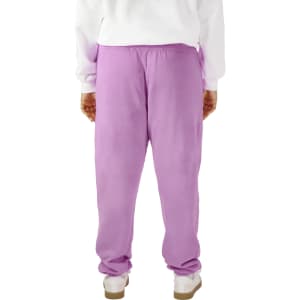 Lightweight sweatpants in a vibrant purple colour, featuring an elastic waistband and a plain design, with a visible logo.