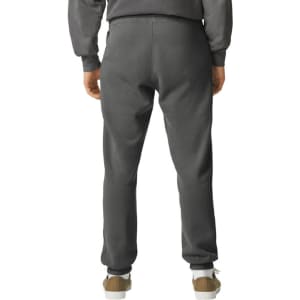 Lightweight grey sweatpants with an elastic waistband and cuffs, featuring a branding logo on the back.