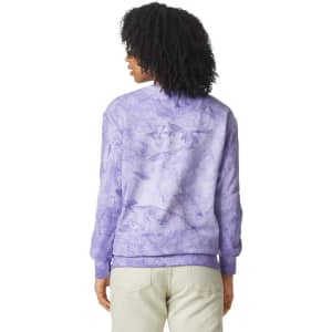 A purple crewneck sweatshirt with a textured design and a logo on the back. Suitable for adults.