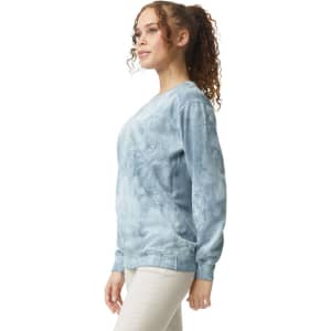 A blue tie-dye crewneck sweatshirt with long sleeves, featuring a subtle pattern and a fitted silhouette.