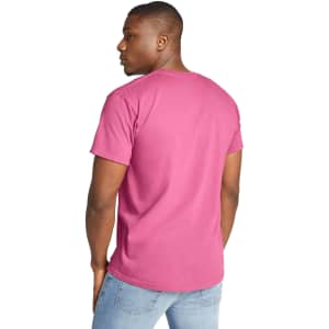 A heavyweight adult t-shirt in vibrant pink, featuring a round neck and short sleeves. The back view shows a plain design.
