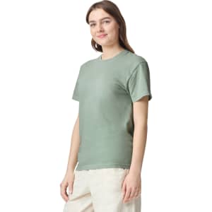 A green heavyweight T-shirt, featuring short sleeves and a crew neck, displayed on a model.