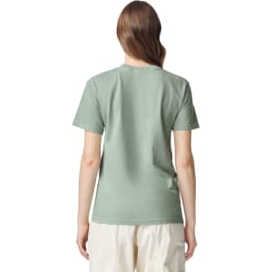 A back view of an adult heavyweight t-shirt in a muted green colour, featuring a simple design and a branded logo.