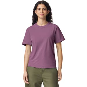 A purple adult heavyweight t-shirt on a model, featuring a classic crew neck and short sleeves.