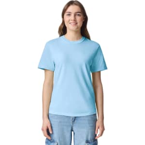 A light blue heavyweight t-shirt, featuring a round neckline and short sleeves, displayed on a model.