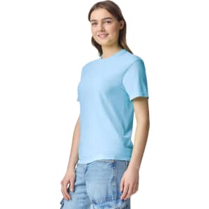 A light blue heavyweight adult t-shirt displayed on a model, featuring a simple design and crew neck.