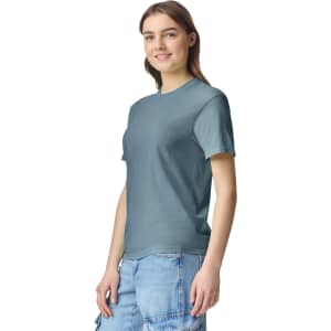 A casual heavyweight t-shirt in a soft blue colour, featuring short sleeves and a relaxed fit, displayed on a model.
