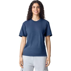 A navy heavyweight t-shirt for adults displayed on a model, featuring a simple design and a round neckline.