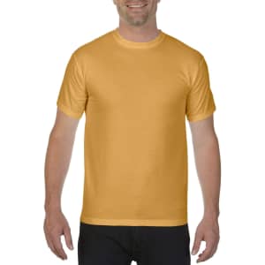 A yellow heavyweight t-shirt displayed on a smiling person with short sleeves and a round neckline.