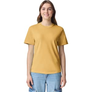 A yellow adult heavyweight T-shirt featuring a crew neck and short sleeves, presented on a model.
