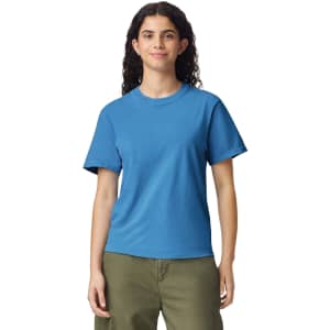 A blue adult heavyweight t-shirt displayed on a model, featuring short sleeves and a crew neckline.