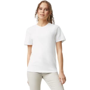 A white heavyweight t-shirt featured on a model with a simple design, showcasing its fit and style.