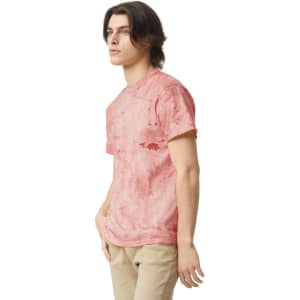A heavyweight T-shirt in a pink marbled pattern, featuring short sleeves and a logo.