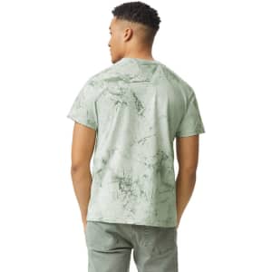 A heavyweight T-shirt in a light green colour with a marbled pattern, featuring a logo on the back.