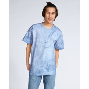 A heavyweight T-shirt in a blue tie-dye pattern worn by a person, featuring a casual fit and a logo.