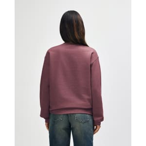 A maroon Gildan Heavy Blend adult crewneck sweatshirt, viewed from the back, featuring long sleeves and a simple design.