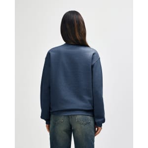 A blue Gildan Heavy Blend adult crewneck sweatshirt viewed from the back, featuring a plain design and a subtle logo.