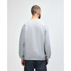 A grey Gildan Heavy Blend adult crewneck sweatshirt featuring a plain back design.