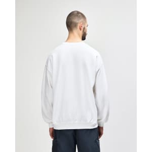 A white Gildan Heavy Blend adult crewneck sweatshirt seen from the back, featuring a plain design and a logo.