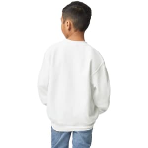 A white Gildan Heavy Blend youth sweatshirt viewed from the back, worn by a child with short black hair.