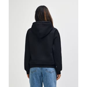 A back view of a black Gildan Heavy Blend hooded sweatshirt, featuring a hood and a plain design.