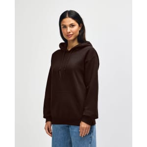 A brown hooded sweatshirt with a kangaroo pocket and a logo. The model is standing against a plain white background.