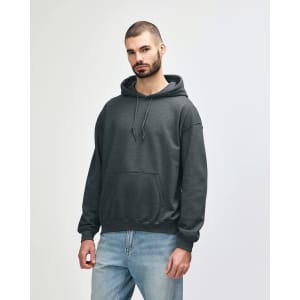 A grey hooded sweatshirt with a front pocket and drawstring details, worn by a model standing casually.