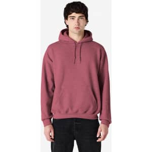 A hooded sweatshirt in a rich burgundy colour, featuring a front pocket and a logo on the chest.
