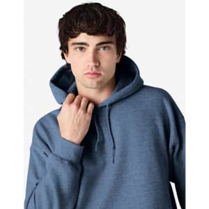 A blue Gildan Heavy Blend adult hooded sweatshirt with a drawstring hood and a subtle logo.