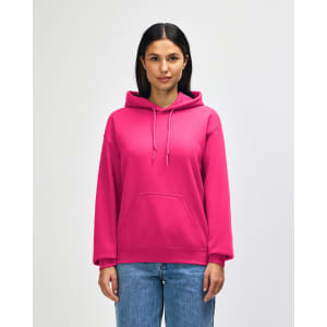 A pink Gildan Heavy Blend adult hooded sweatshirt with a front pocket and a hood. The model stands in a neutral background.