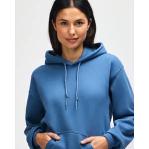 A blue hooded sweatshirt with a female model showcasing the product, featuring a logo on the fabric.
