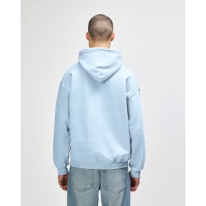 A light blue Gildan Heavy Blend adult hooded sweatshirt is displayed from the back, featuring a hood and relaxed fit.