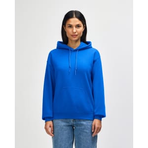 A blue hooded sweatshirt with a front pocket, featuring a logo, worn by a model against a plain background.