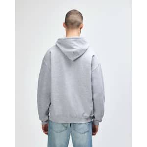 A grey Gildan Heavy Blend adult hooded sweatshirt with a large hood, viewed from the back.