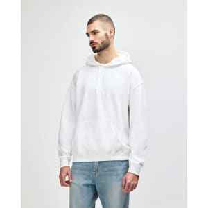 A white Gildan Heavy Blend adult hooded sweatshirt with a front pocket and an attached hood.