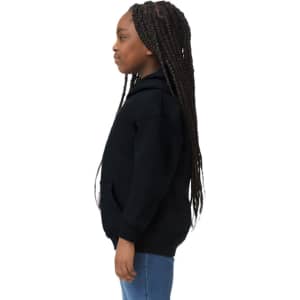A black Gildan Heavy Blend youth hooded sweatshirt displayed on a child from the side, featuring a hood and pockets.