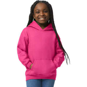 A girl wearing a pink Gildan Heavy Blend youth hooded sweatshirt, featuring a front pocket and hood.