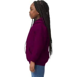 A youth hooded sweatshirt in deep purple with a front pocket and a hood, displayed on a girl with long braided hair.