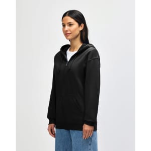 A black Gildan Heavy Blend adult full zip hooded sweatshirt on a model, featuring a front zipper and logo.