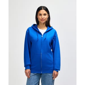 A blue Gildan Heavy Blend adult full zip hooded sweatshirt on a model, featuring a front pocket and a logo.