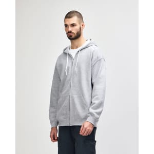 A grey Gildan Heavy Blend adult full zip hooded sweatshirt, featuring a logo and front pockets.