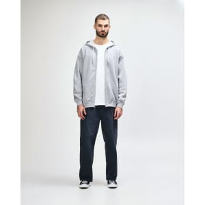 A grey full zip hooded sweatshirt featuring a front pocket and a hood. It has a logo on the side.