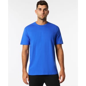 A blue Gildan Ultra Cotton adult t-shirt on a model, featuring a plain design and a logo on the label.